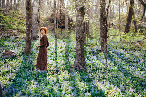 Beautiful young woman in the forest