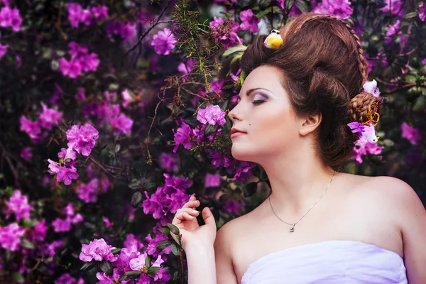 Woman in pink gown — Stock Photo, Image