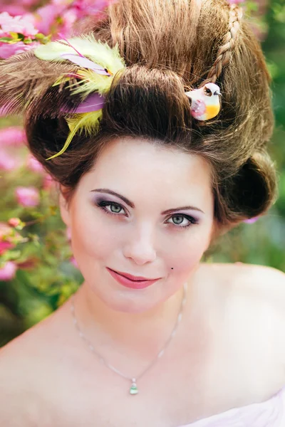 Woman in pink gown — Stock Photo, Image