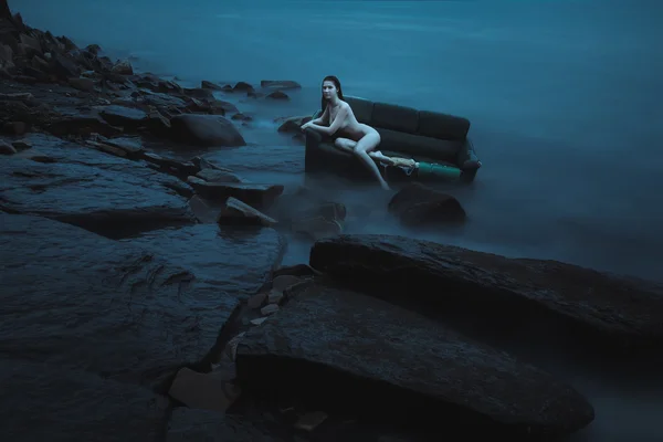 Young nude woman in the sea — Stock Photo, Image