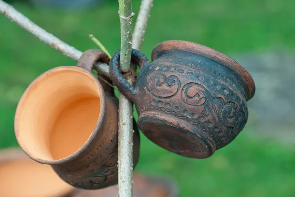 Copo de barro em um pau — Fotografia de Stock