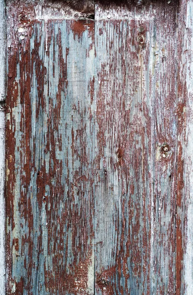 Partie de la vieille porte en bois en mauvais état avec peinture à peler — Photo