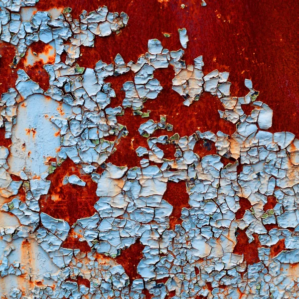 金属の背景に隠れての錆のひびの入ったペイントオールドのグランジ テクスチャ — ストック写真