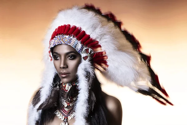 American Indian woman model girl studio portrait wearing war bonnet — Stock Photo, Image