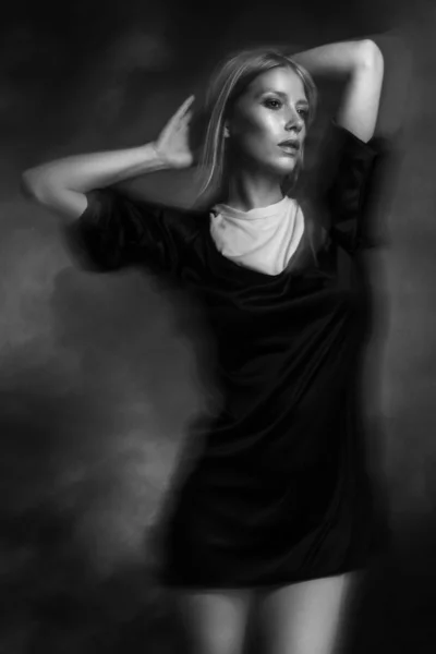 Exceptional beautiful blond young girl fashion model artistic portrait short black dress — Zdjęcie stockowe