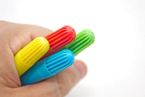 Hand holding pens — Stock Photo, Image