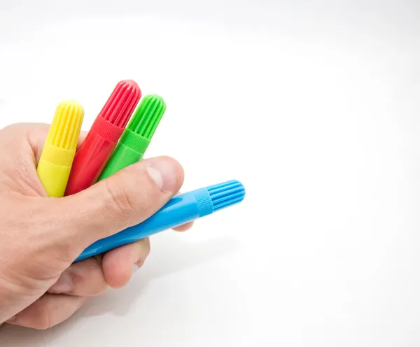 Hand holding pens — Stock Photo, Image