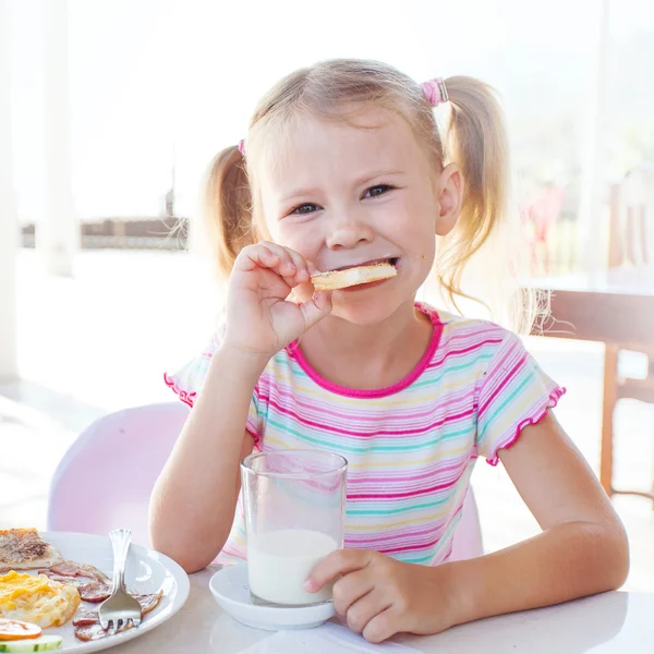 Child with a glass of milk — Stock Photo, Image