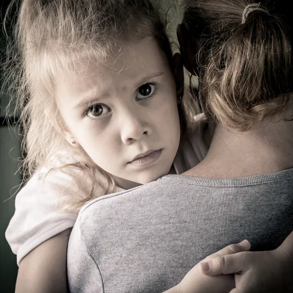 Sad daughter hugging his mother — Stock Photo, Image