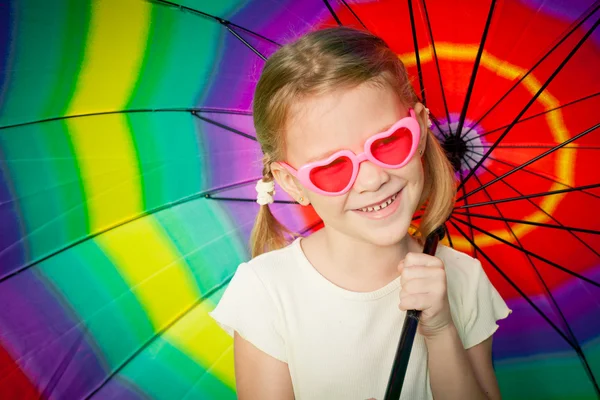 Girl on the nature with an umbrella in his hand — Stock Photo, Image