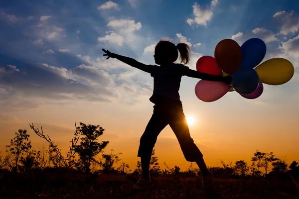 Little girl jumping on the nature — Stock Photo, Image