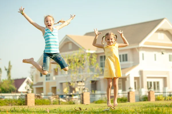 Two happy  girls on the nature — Stock Photo, Image