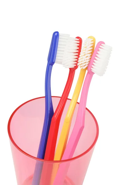 Brosses à dents dans un récipient en plastique — Photo