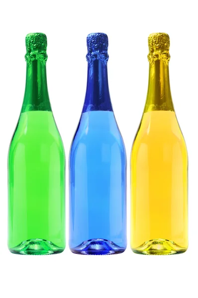 Drie flessen van koolzuurhoudende dranken — Stockfoto
