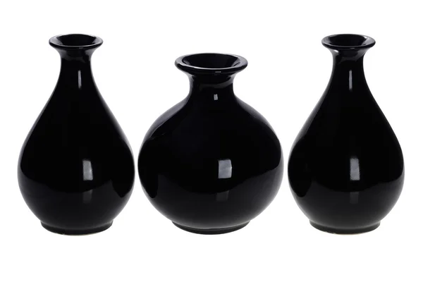 Üç siyah şarap şişeleri — Stok fotoğraf