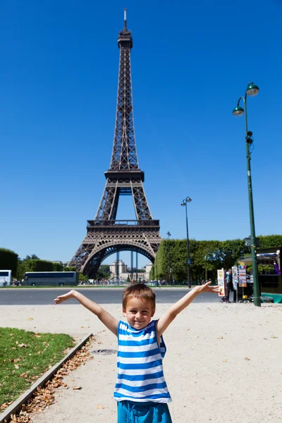 Child under Eiffel tower Stock Image