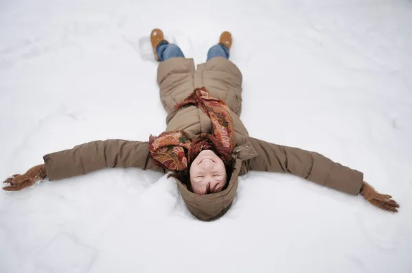 Winter fun - snow angel — Stock Photo, Image