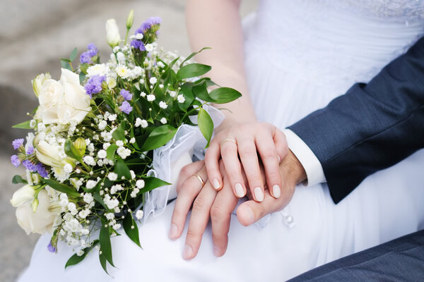 Bride and groom's hands