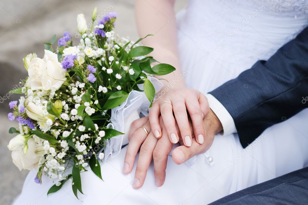 Bride and groom's hands