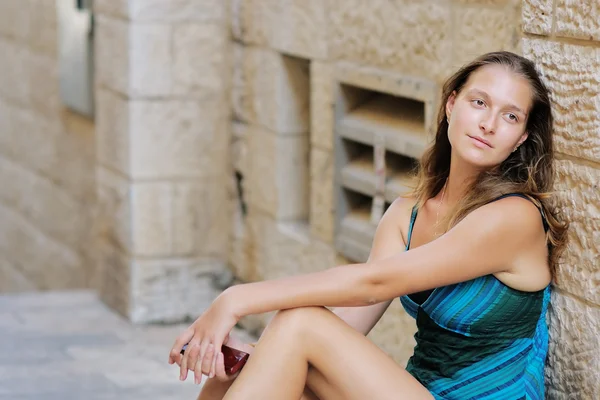 Young woman in old town — Stock Photo, Image