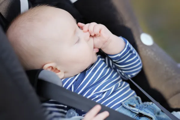 Baby boy sucking his thumb and sleeping — Stock Photo, Image