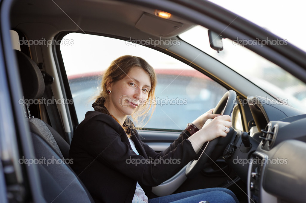 Woman portrait in a car