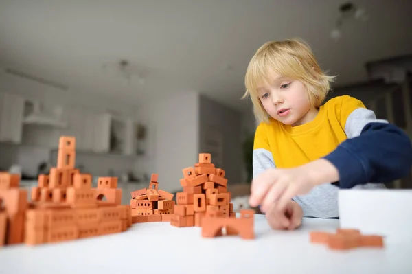 Preschooler Boy Playing Real Small Clay Bricks Table Home Child — Stock Photo, Image