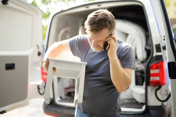 Man Unloading Pickup Truck Bringing Furniture New House Moving Day — 스톡 사진