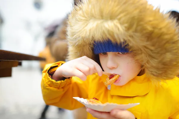 Child Eating Traditional Poland Street Food Oscypek Christmas Market Krakow — Stockfoto