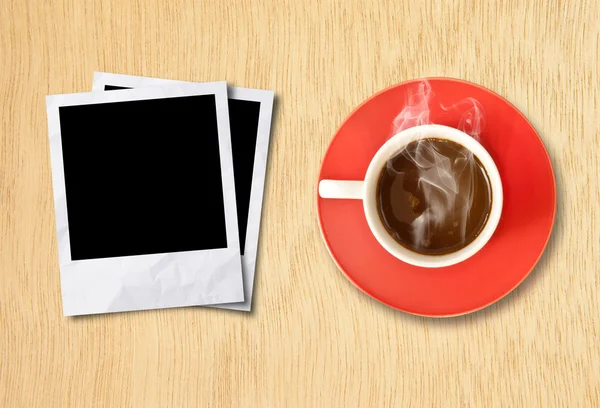 Cup coffee and photo frame — Stock Photo, Image