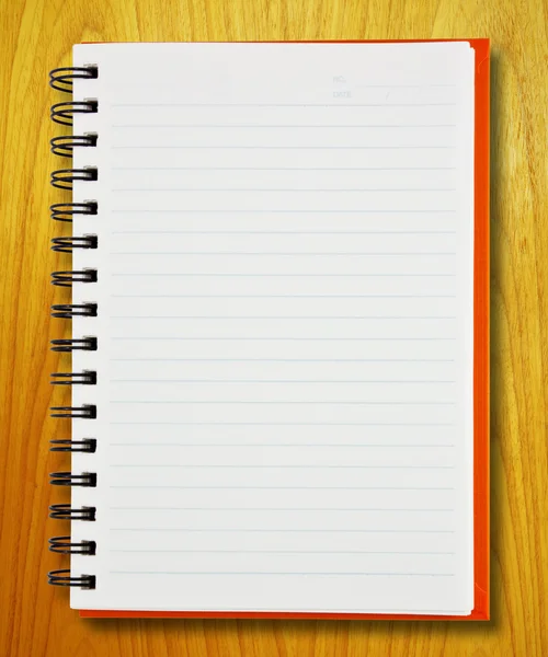 Notebook sobre madeira — Fotografia de Stock