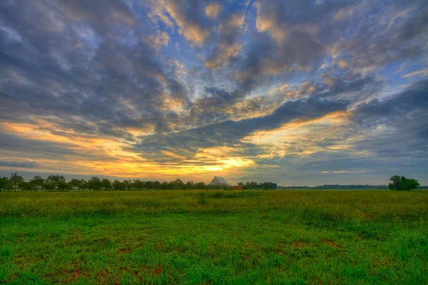 Paisaje con puesta de sol —  Fotos de Stock