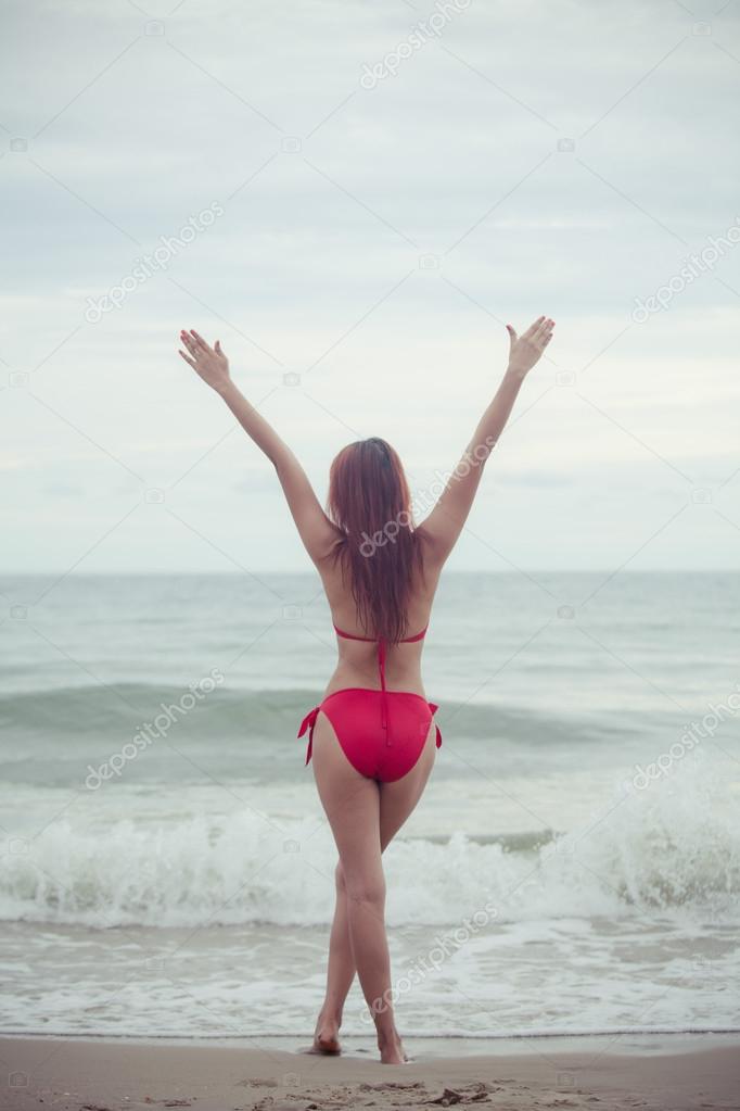 asian woman in red bikini