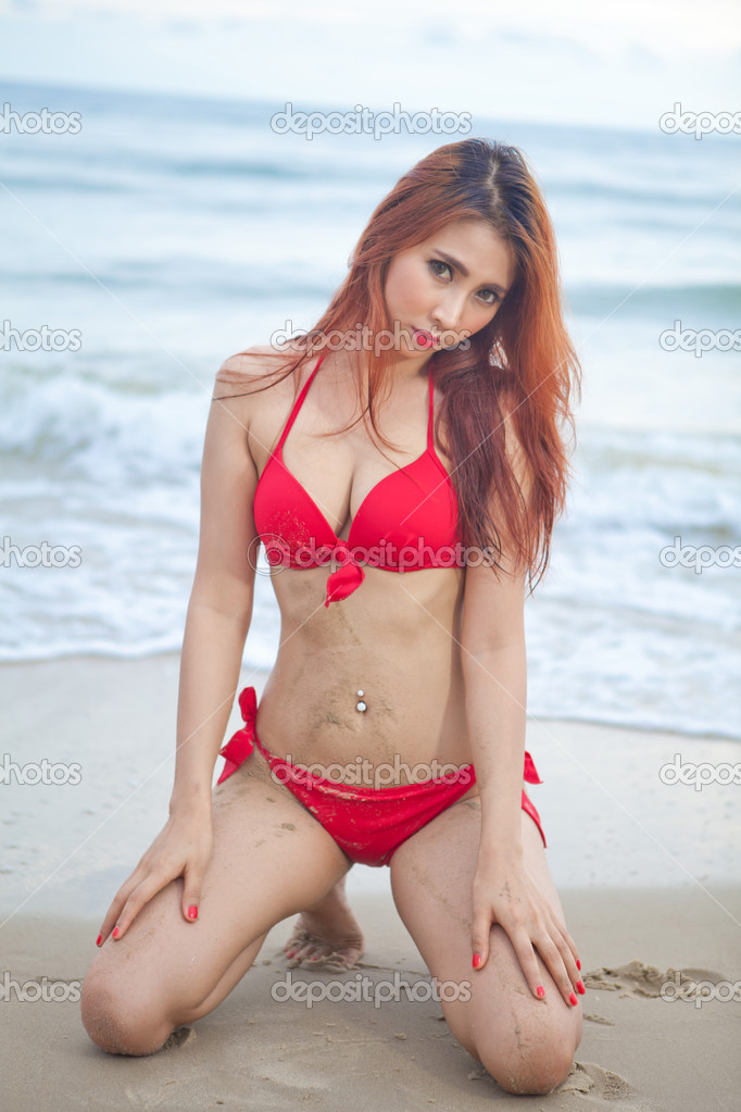 Woman posing at beach