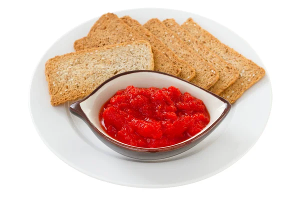Красный соус с тостами — стоковое фото