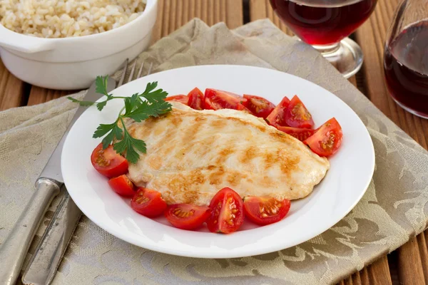 Chicken with tomato and rice integral — Stock Photo, Image