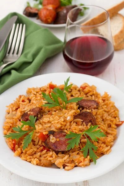 Sausages with rice on the white plate — Stock Photo, Image