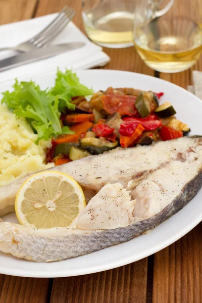 Boiled fish with vegetables, salad and mashed potato — Stock Photo, Image