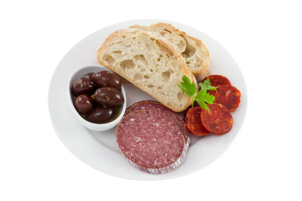 Saucisses à l'huile d'olive et pain dans l'assiette — Photo