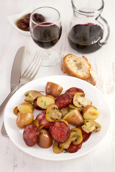 Salad with sausages and mushrooms on the plate — Stock Photo, Image