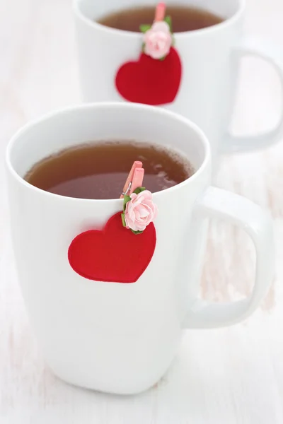 Dos tazas de té con corazones — Foto de Stock