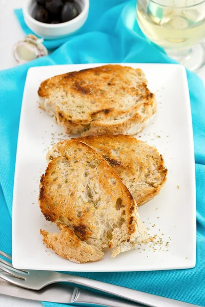 Fried bread on the white plate — Stock Photo, Image