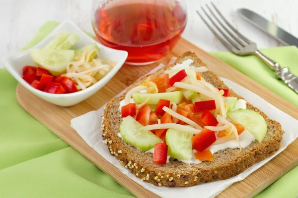 Toast with cheese, pepper, cucumber on the plate — Stock Photo, Image