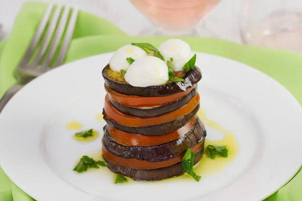 Eggplant with tomato, oil and cheese mozzarella — Stock Photo, Image