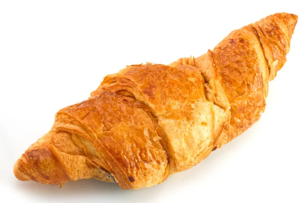 Croissant på vit bakgrund — Stockfoto