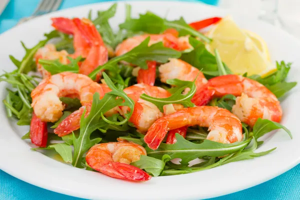 Salad with seafood on the white plate — Stock Photo, Image