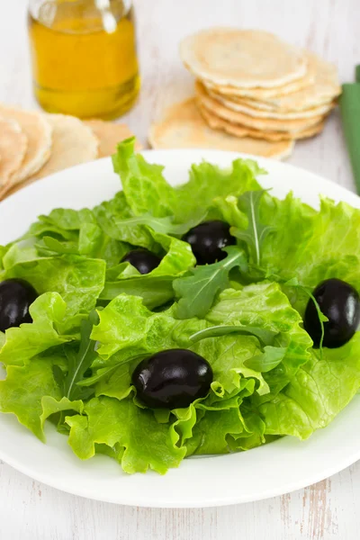Salad on the white plate — Stock Photo, Image