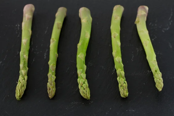 Asparagus on dark background — Stock Photo, Image