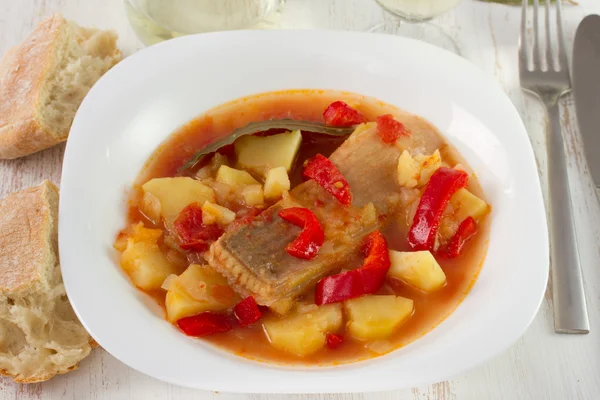 Fish stew on the white plate — Stock Photo, Image
