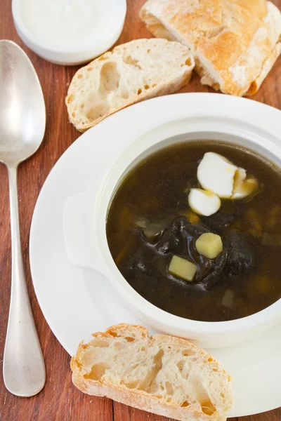 Mushroom soup with cream in white bowl — Stock Photo, Image